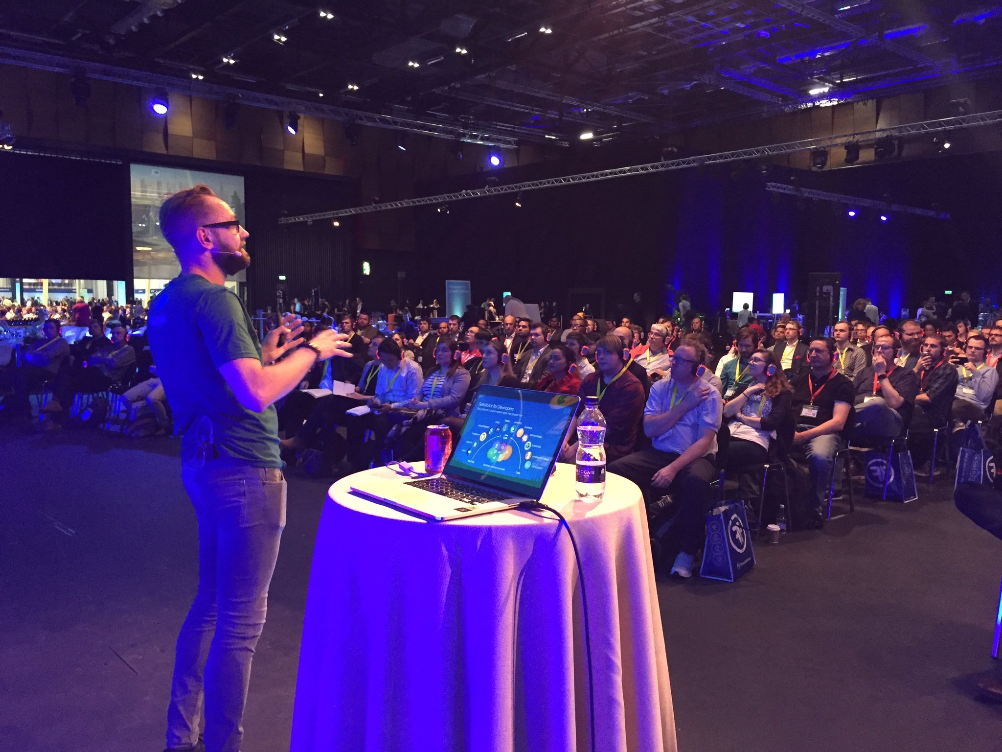 René giving a talk in front of a few hundred people